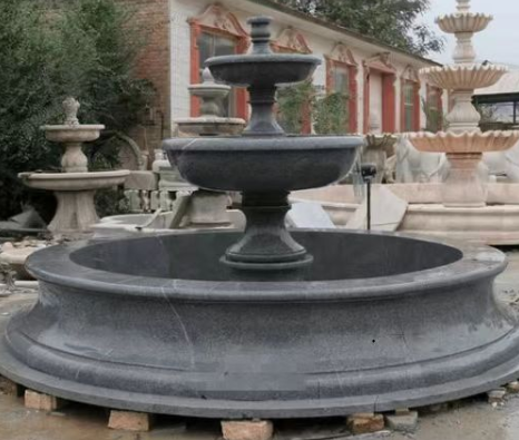 Perché dovrei scegliere una fontana di marmo per il mio spazio?