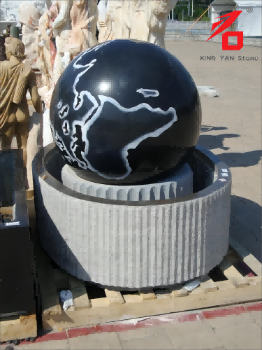Fontana con palla di granito
